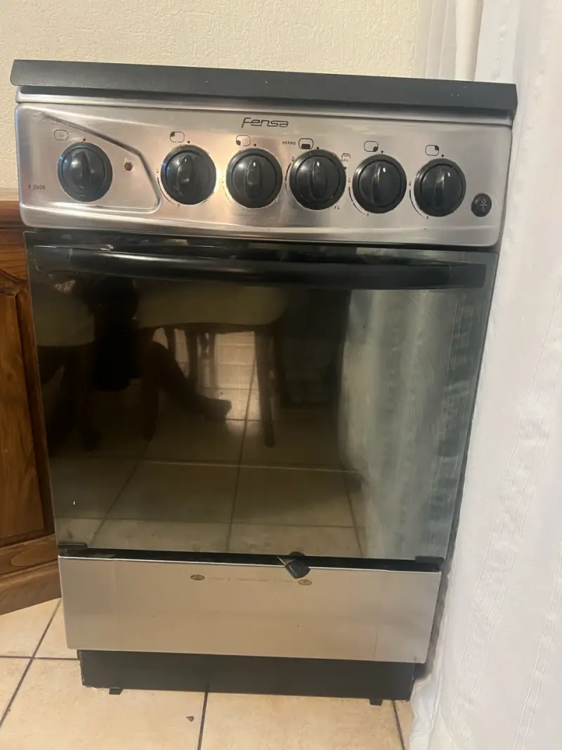 Cocina a gas Fensa con horno y 4 quemadores - 1