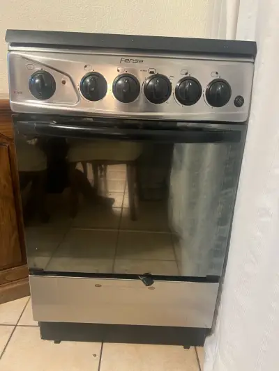 Cocina a gas Fensa con horno y 4 quemadores - miniatura 1