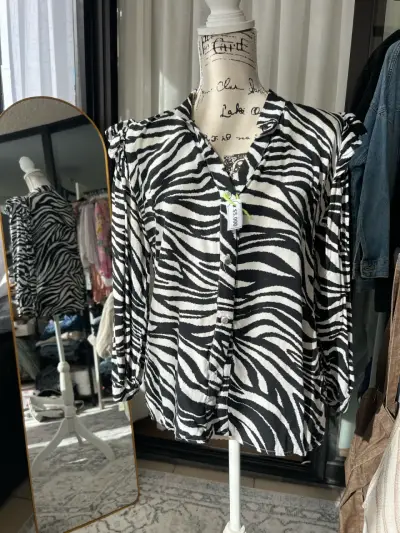 Blusa estampado cebra manga larga - miniatura 1