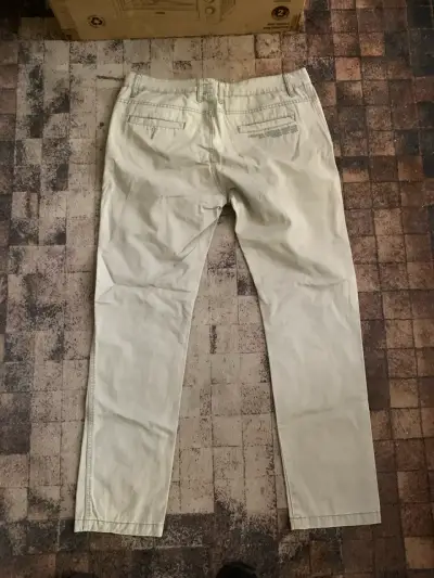 Pantalones beige Rip Curl talla 34 - miniatura 1
