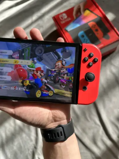 Nintendo Switch Oled Neon + Mario Kart 8 Deluxe - miniatura 4