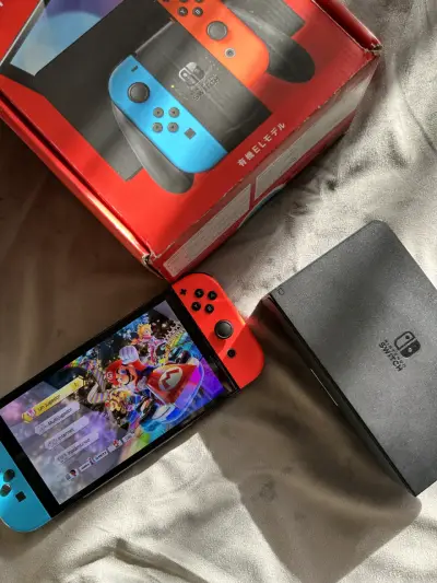 Nintendo Switch Oled Neon + Mario Kart 8 Deluxe - miniatura 5