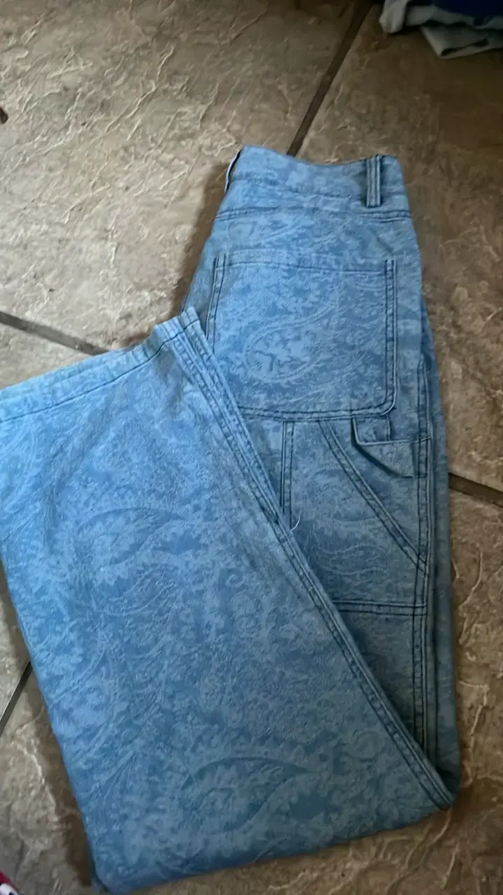 Jeans azules estampados University Club