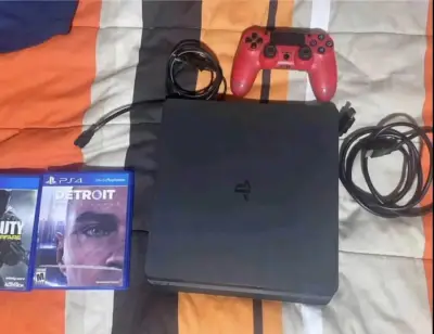 Consola PS4 con control rojo y juegos incluidos - miniatura 1
