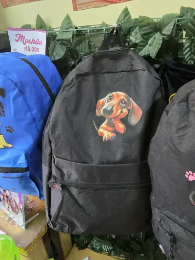 Mochila azul con diseño de perro y botas amarillas - miniatura 2