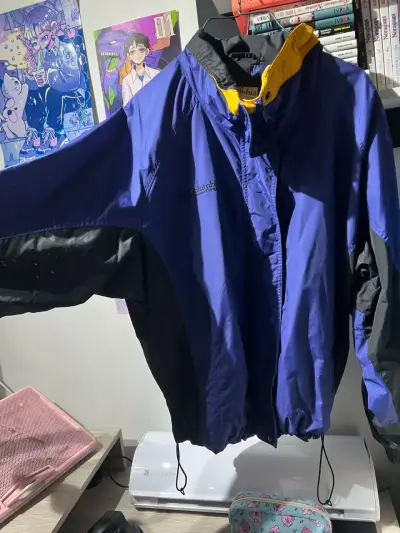 Chaqueta impermeable Columbia azul y negra - miniatura 1