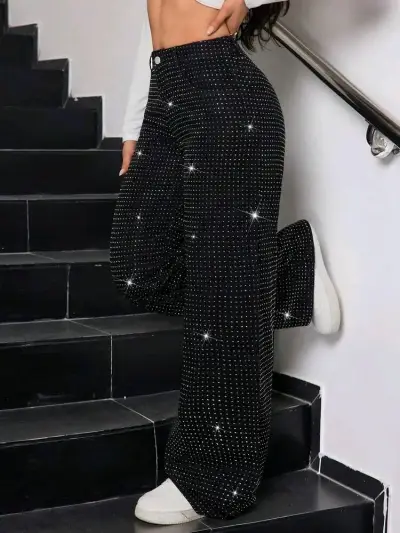 Pantalones acampanados negros con brillo para mujer - miniatura 1