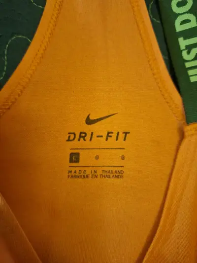 Polera Deportiva Mujer Nike Naranja Dri-Fit - miniatura 2