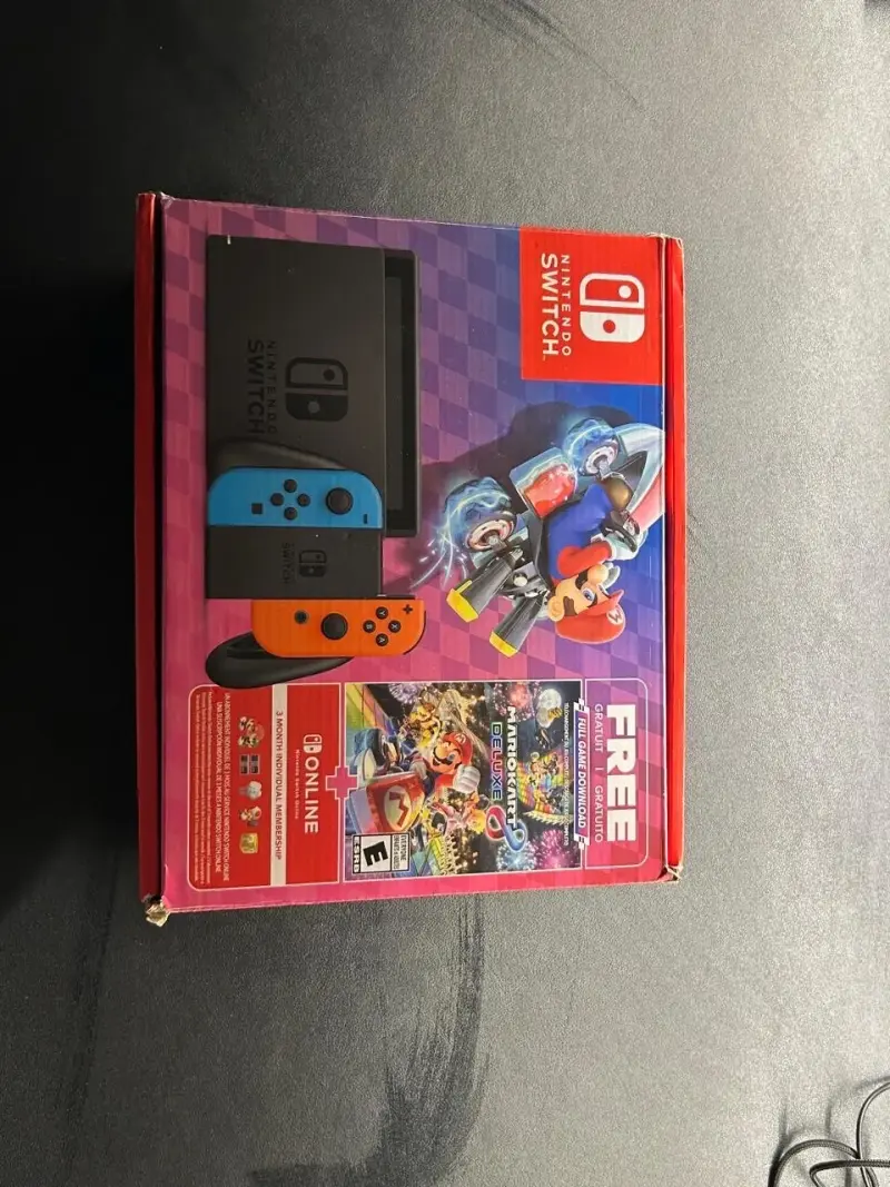 Consola Nintendo Switch con accesorios y juegos - 4