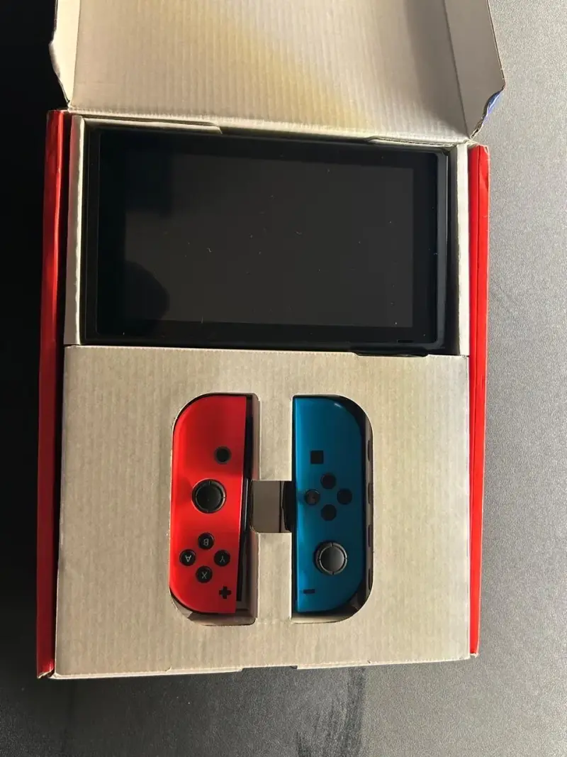 Consola Nintendo Switch con accesorios y juegos - 5
