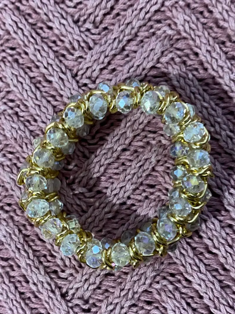 Pulsera elástica de cuentas doradas y transparentes - 1