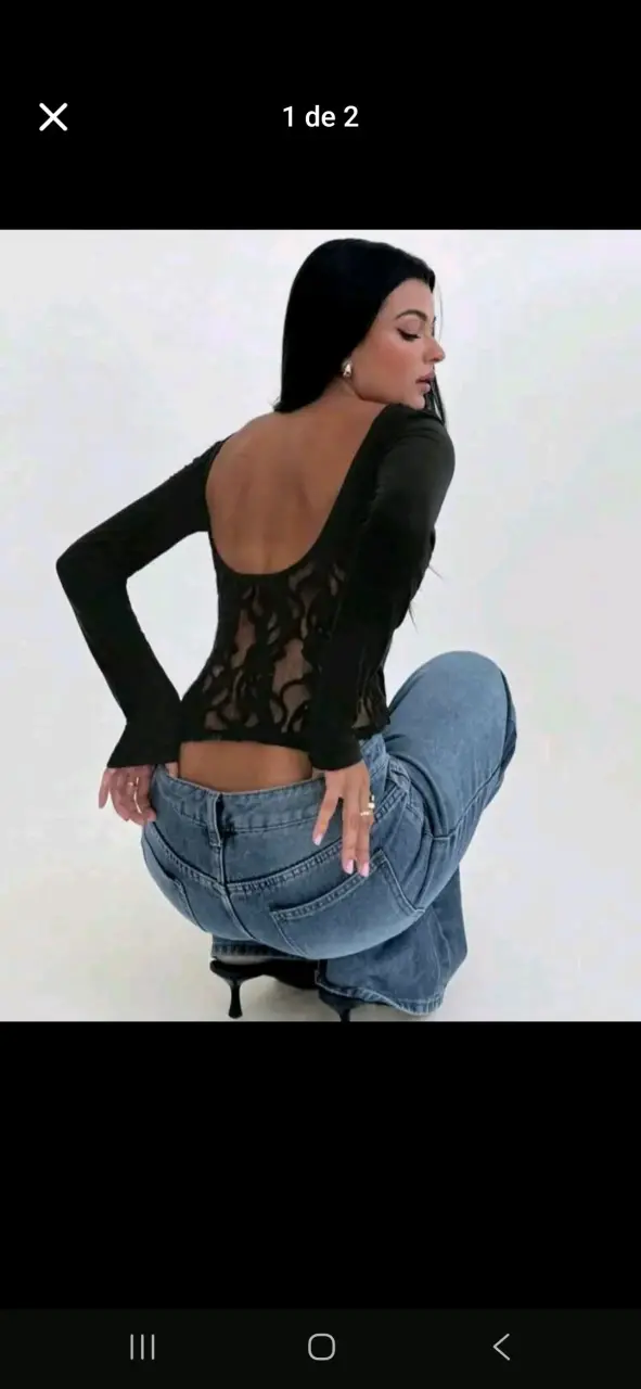 Blusa negra de encaje con espalda descubierta