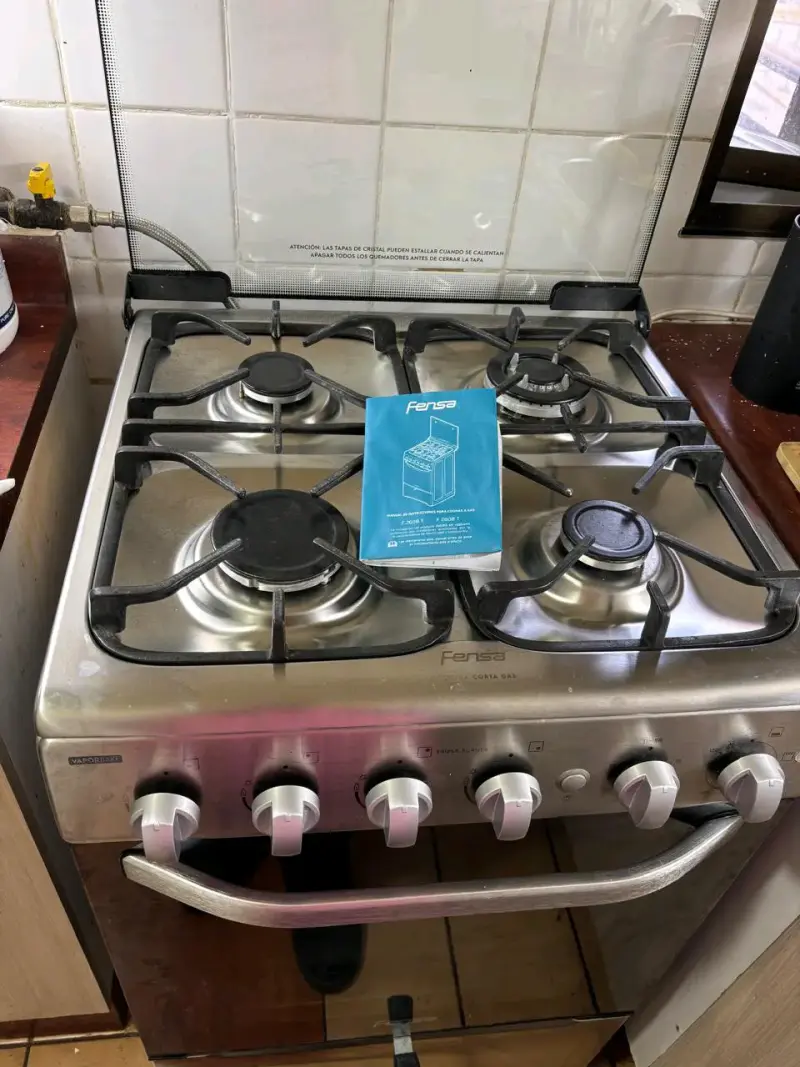 Cocina a gas Fensa con horno y 4 quemadores - 1