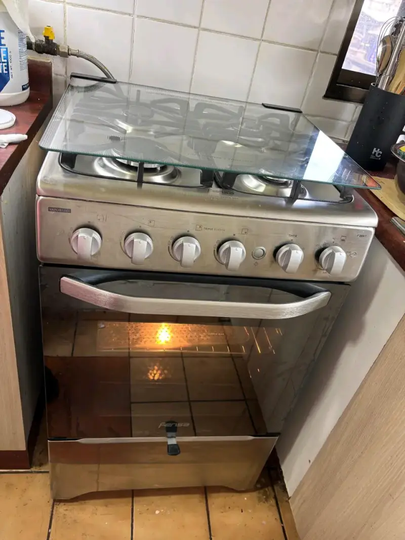 Cocina a gas Fensa con horno y 4 quemadores - 4