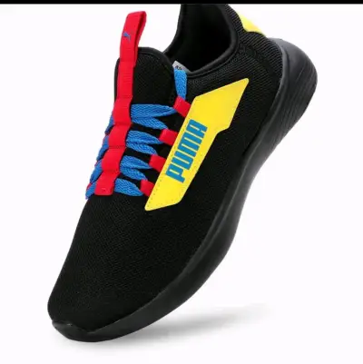 Zapatillas deportivas Puma negras con detalles coloridos - miniatura 1