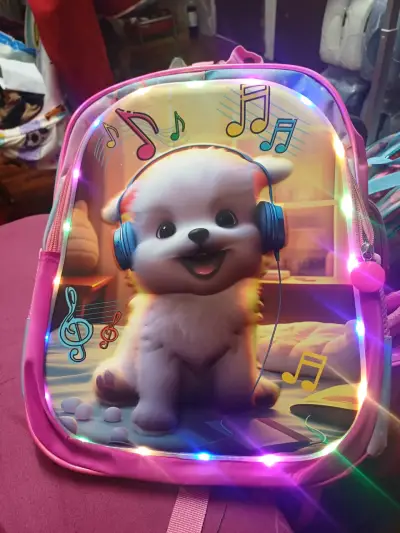 Mochila infantil con luces LED y diseño de perrito - miniatura 1