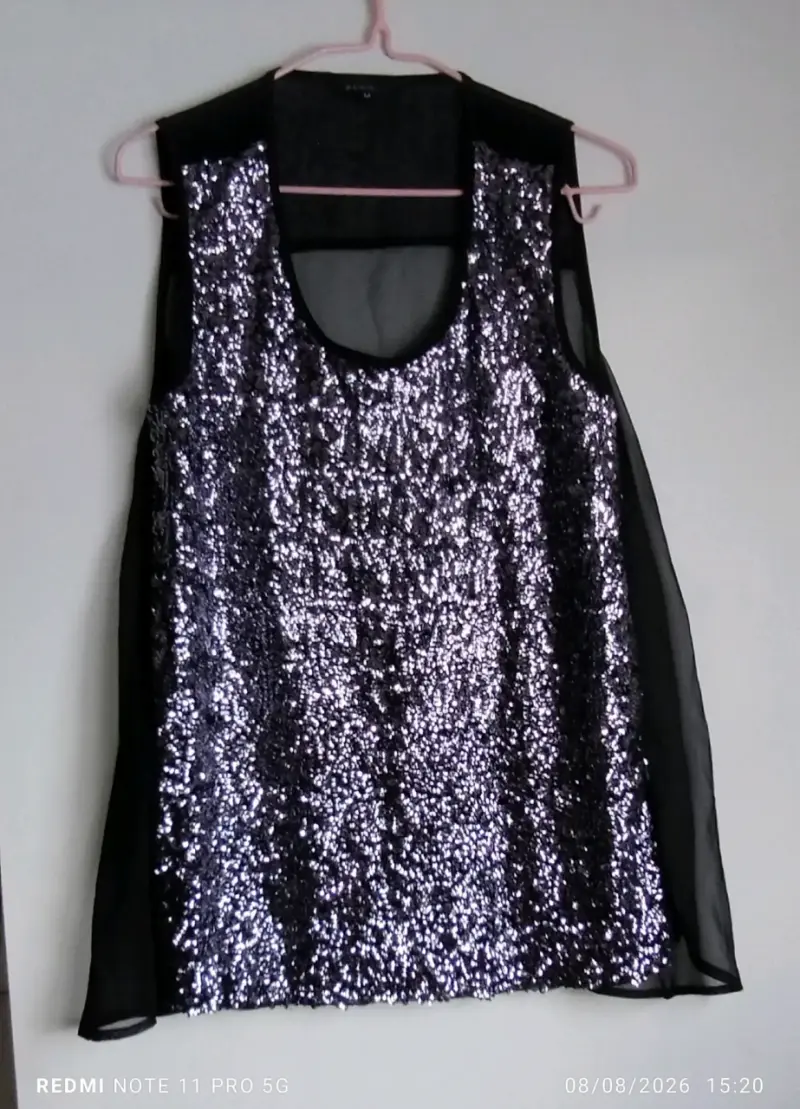 Blusa sin mangas con lentejuelas negras - 1