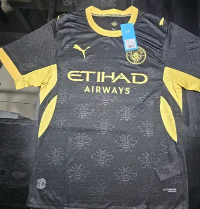 Camiseta Manchester City Puma Negra y Amarilla - miniatura 1