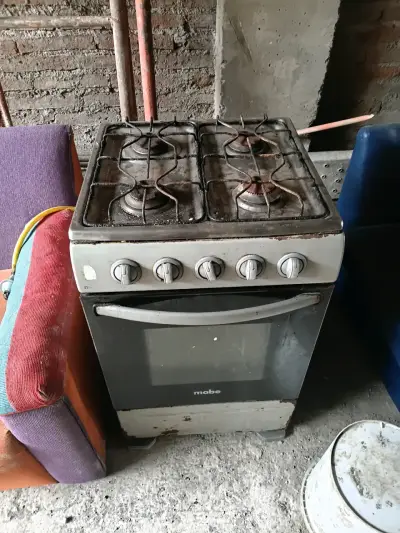 Cocina a gas Mabe de 4 quemadores usada - miniatura 1