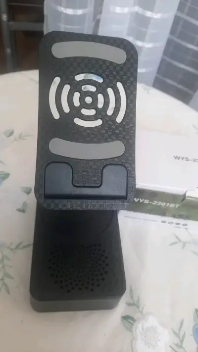 Soporte de Teléfono con Cargador Inalámbrico y Altavoz Bluetooth - miniatura 1