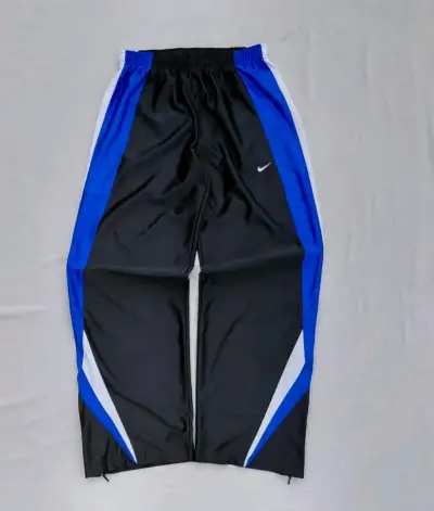 Pantalones deportivos Nike negros y azules - miniatura 1
