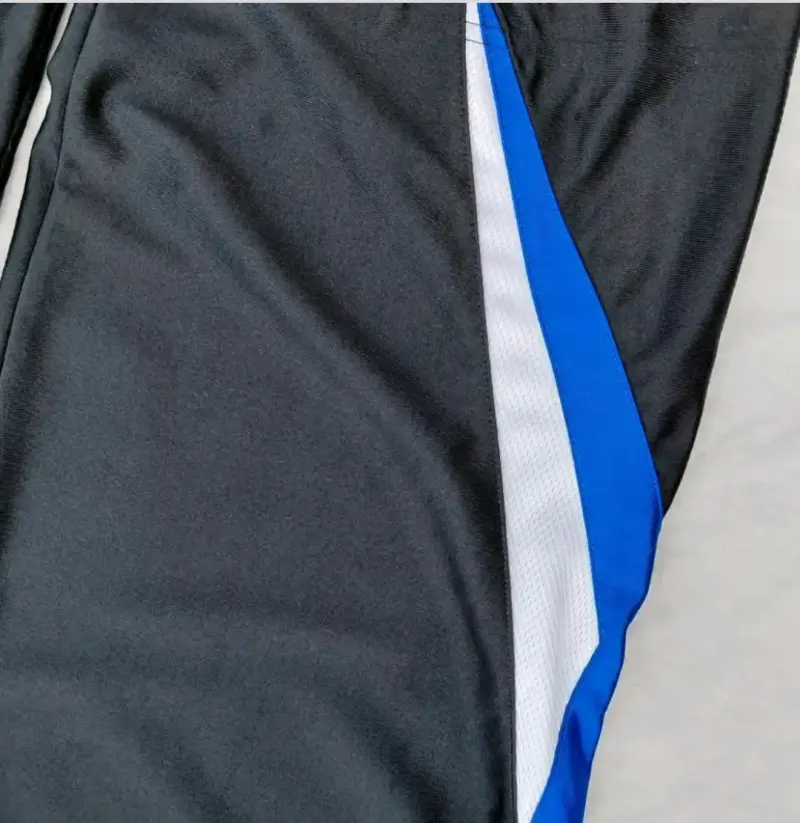 Pantalones deportivos Nike negros y azules - 4