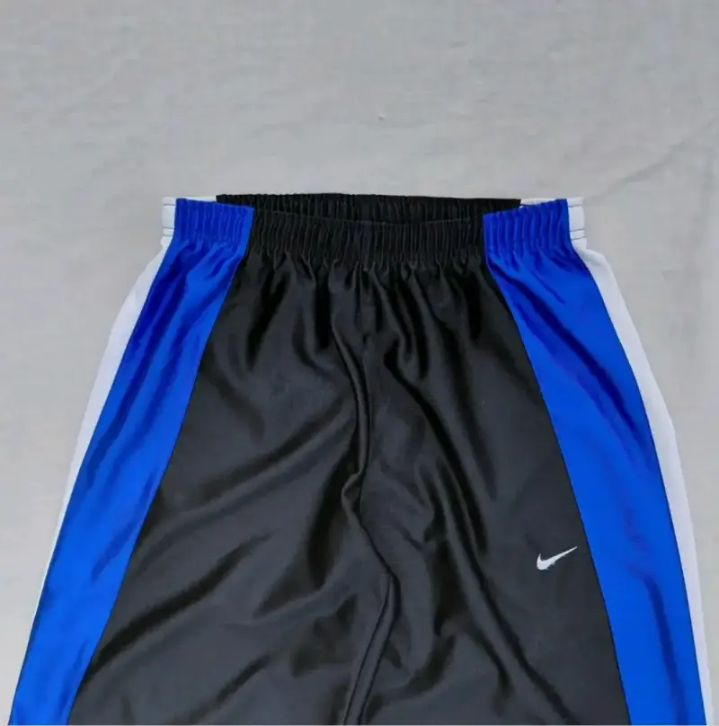 Pantalones deportivos Nike negros y azules - 5