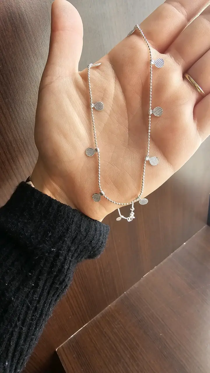 Set de pulseras de plata con dijes variados - 2