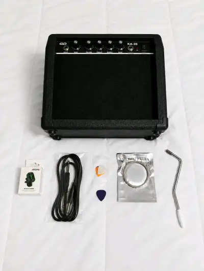 Guitarra eléctrica negra con amplificador y accesorios - miniatura 2