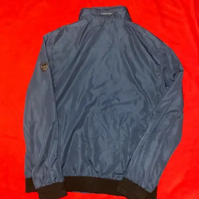 Chaqueta azul Calvin Klein con cierre reflectante - miniatura 5