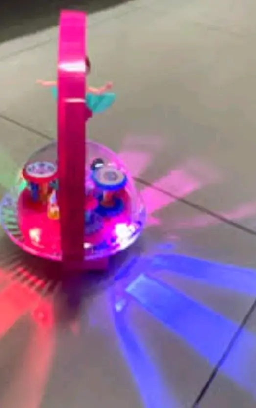 Juguete musical con bailarina giratoria y luces LED - 2