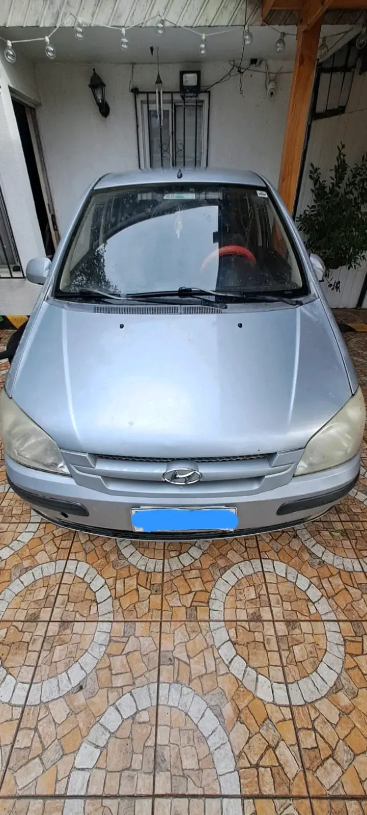 Hyundai getz plateado en buen estado - 2