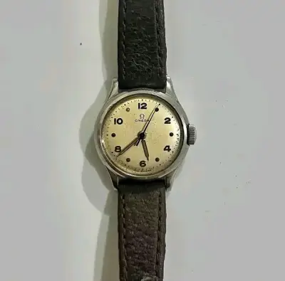 Reloj vintage Omega de pulsera con correa de cuero - miniatura 1