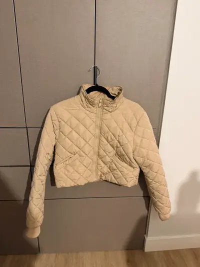 Chaqueta acolchada beige para mujer - miniatura 1