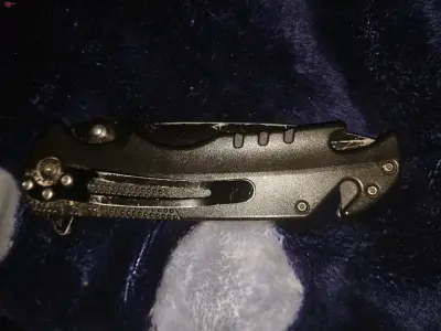 Cuchillo plegable táctico con cortador de cinturón - miniatura 2