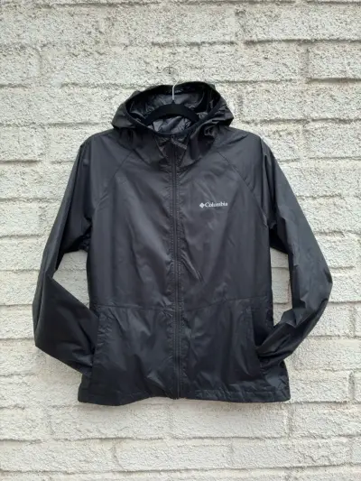 Chaqueta impermeable Columbia negra con capucha - miniatura 1