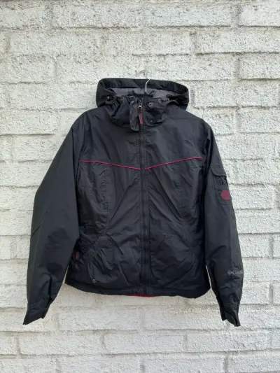 Chaqueta impermeable Columbia negra con capucha - miniatura 1