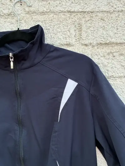 Chaqueta deportiva Nike azul con detalles blancos - miniatura 2