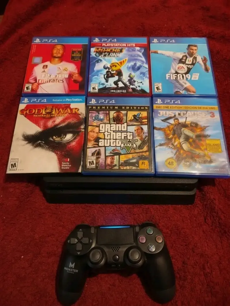 Consola PS4 con juegos y control
