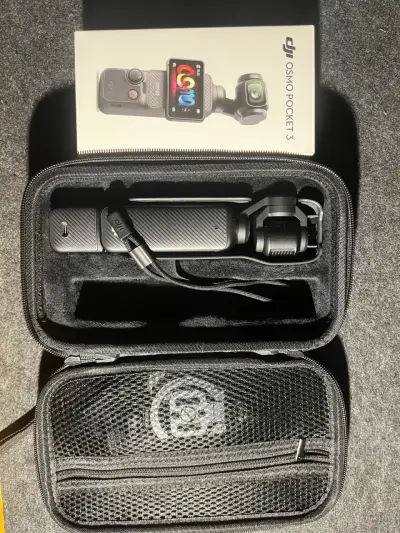 Cámara DJI Osmo Pocket 3 con Estuche y Adaptador - miniatura 1