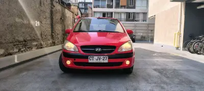 Hyundai Getz 2011, 124.900 km, rojo en buen estado - miniatura 1