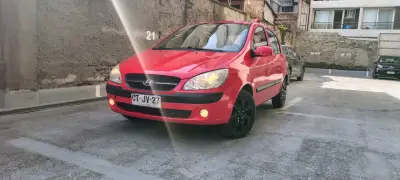 Hyundai Getz 2011, 124.900 km, rojo en buen estado - miniatura 2