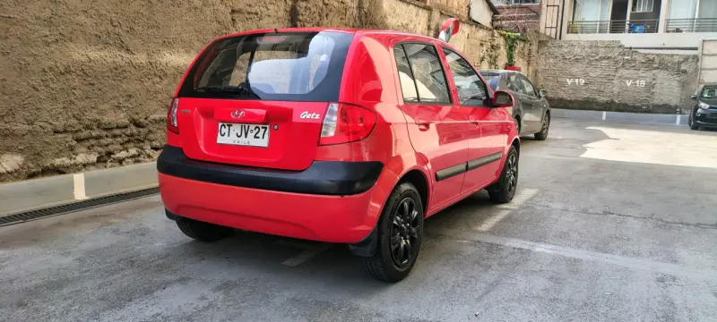 Hyundai Getz 2011, 124.900 km, rojo en buen estado - 4