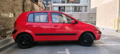 Hyundai Getz 2011, 124.900 km, rojo en buen estado - miniatura 6