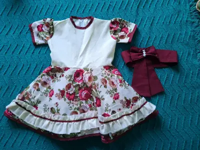 Vestido infantil floral con lazo - miniatura 1