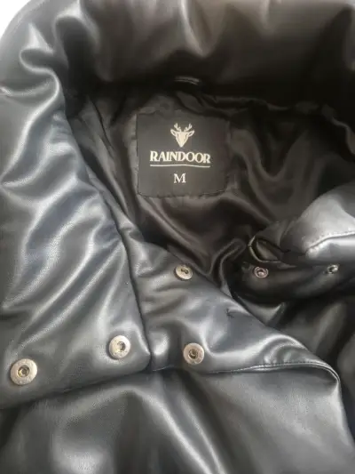 Chaqueta acolchada negra Raindoor para invierno - miniatura 3
