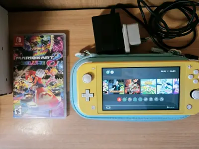 Nintendo Switch Lite amarilla con Mario Kart 8 - miniatura 1