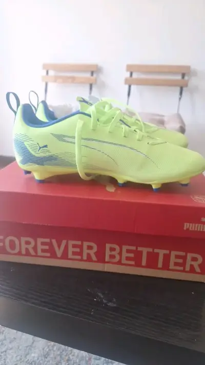 Zapatillas de fútbol Puma Ultra amarillas - miniatura 1