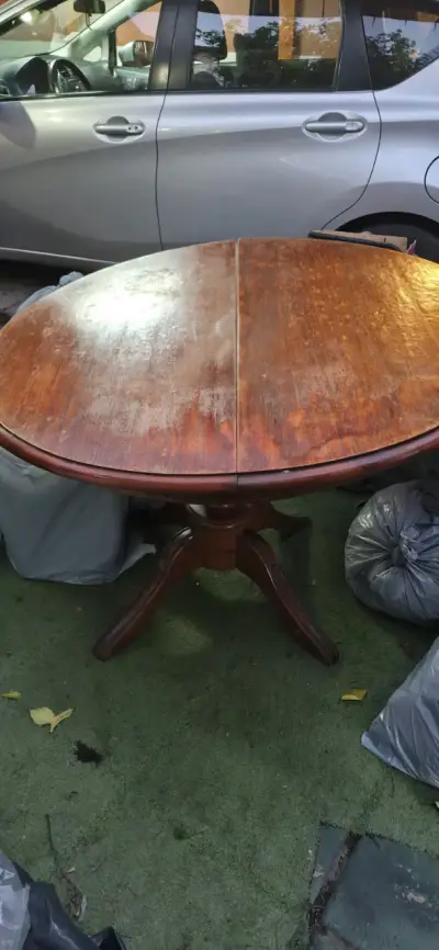 Mesa de comedor redonda de madera extendible. - miniatura 2