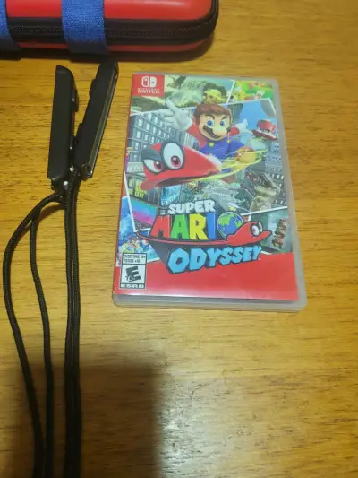 Nintendo Switch con accesorios y juego Super Mario Odyssey - miniatura 5
